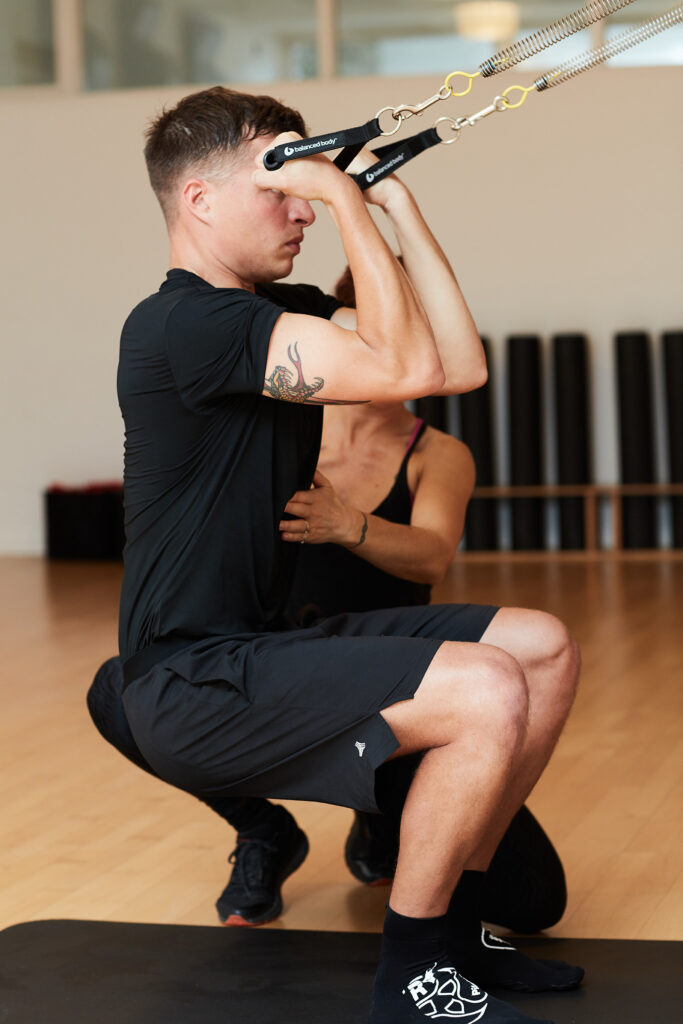 squats Pilates springboard mænd